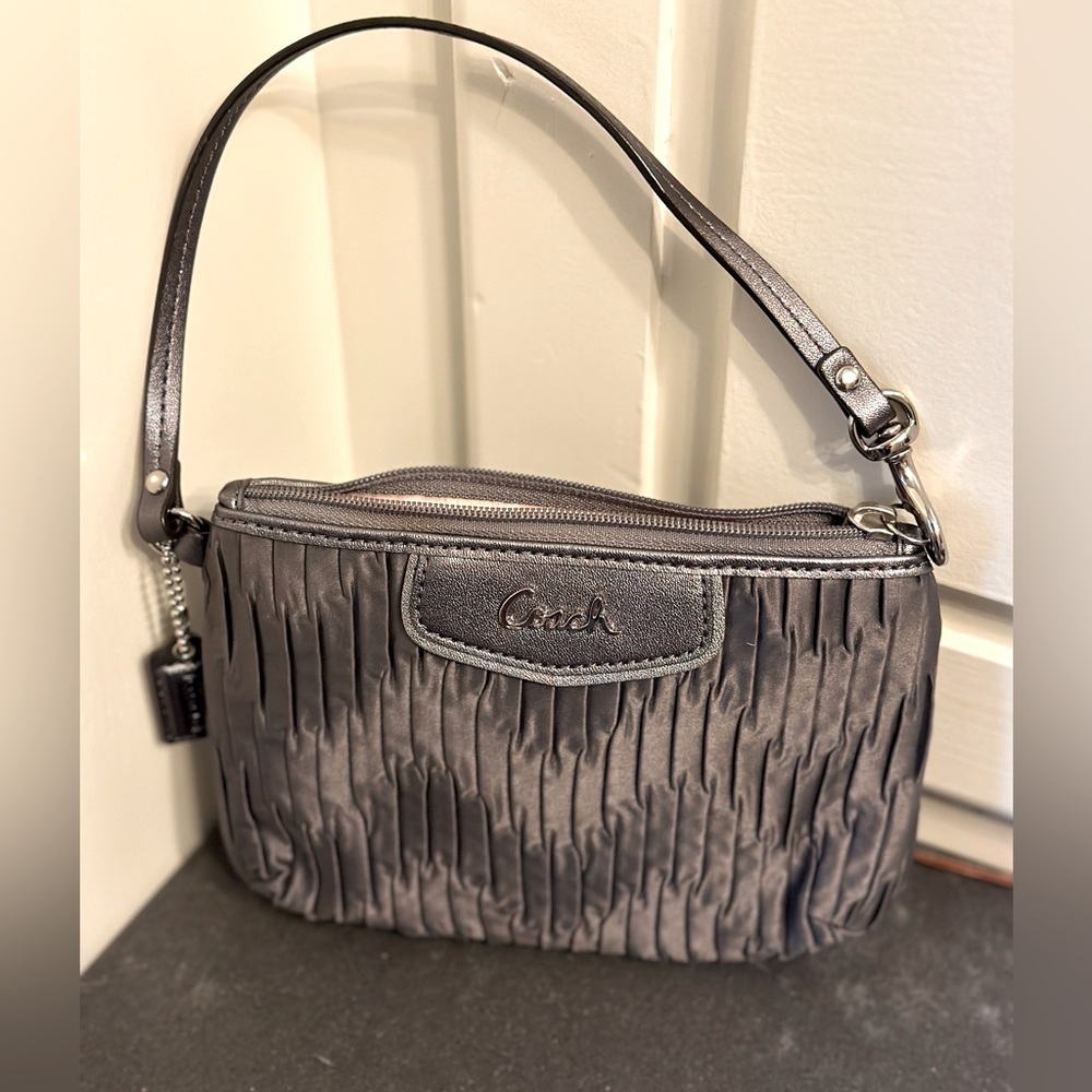 Coach wristlet, graphite silk with pink silk interior